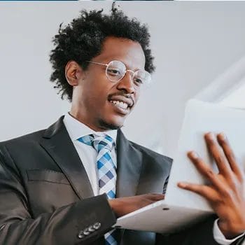 A man reading a document about types of corporations