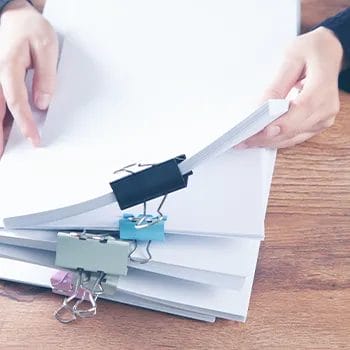 A man preparing the documents for reserving the names