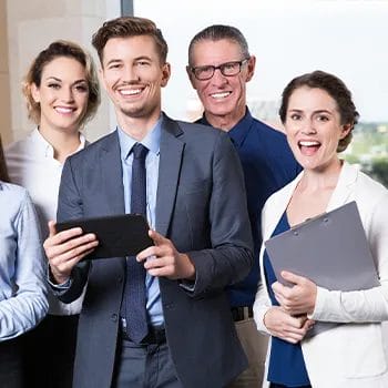 Workers smiling at the camera