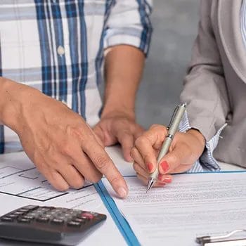 Pointing at documents and signing it