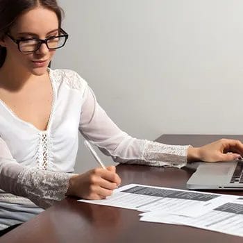 Woman busy working on her table