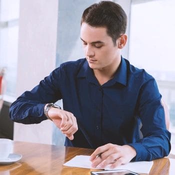 An LLC owner waiting for paperwork in an office