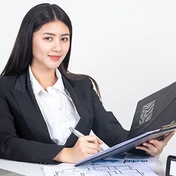 A woman busy working with document files