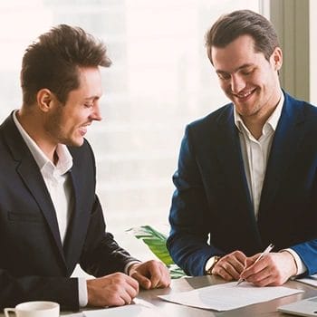 Two office workers in an agreement