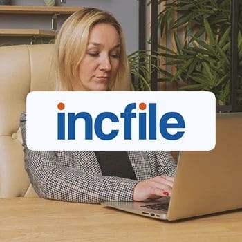 Incfile logo with a businesswoman in the background