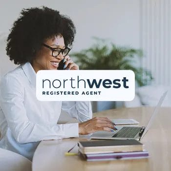 Northwest Registered Agent Service logo with a business woman in the background