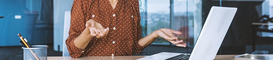 An office worker reading the advantages of working with a registered agent service in Minnesota