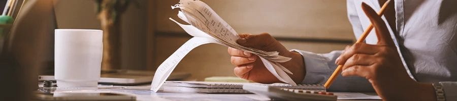 An LLC owner calculating business license taxes