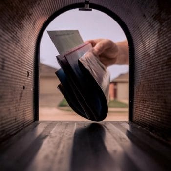 Letters in a mailbox showing how to change registered agent in Arizona